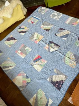 Handmade feed sack quilt