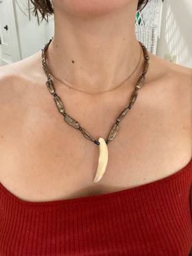 Pearl and unknown animal tooth necklace