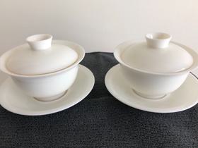 white glaze cups with saucers