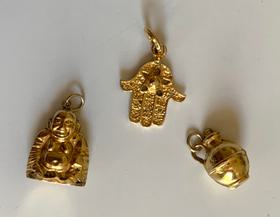 Lot of three 10k gold charms