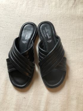 Black leather puffy slide sandals