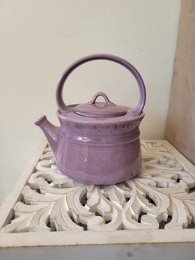 Purple ceramic teapot