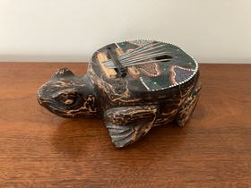 folk art carved turtle thumb piano