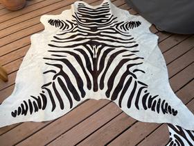 Zebra printed genuine cow hide rug
