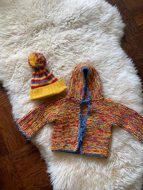 Hand knit primary color sweater and hat