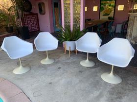 Four mid century tulip chairs