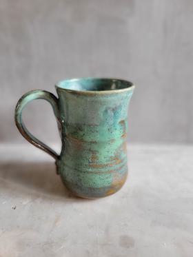 Glazed pottery mug