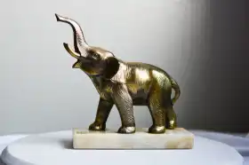 Vintage brass elephant onyx stand