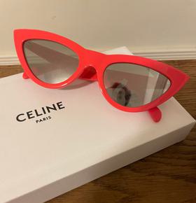 Red cat eye sunglasses.