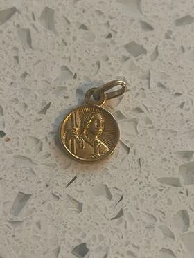 Tiny gold plated Joan of Arc charm