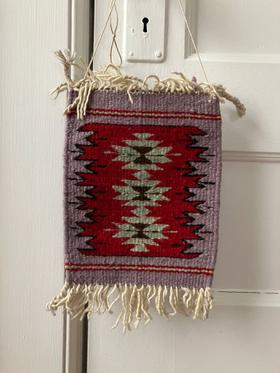 small woven wall hanging