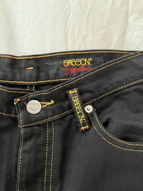 Black jeans with yellow top stitching