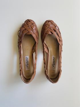 Brown braided leather flats